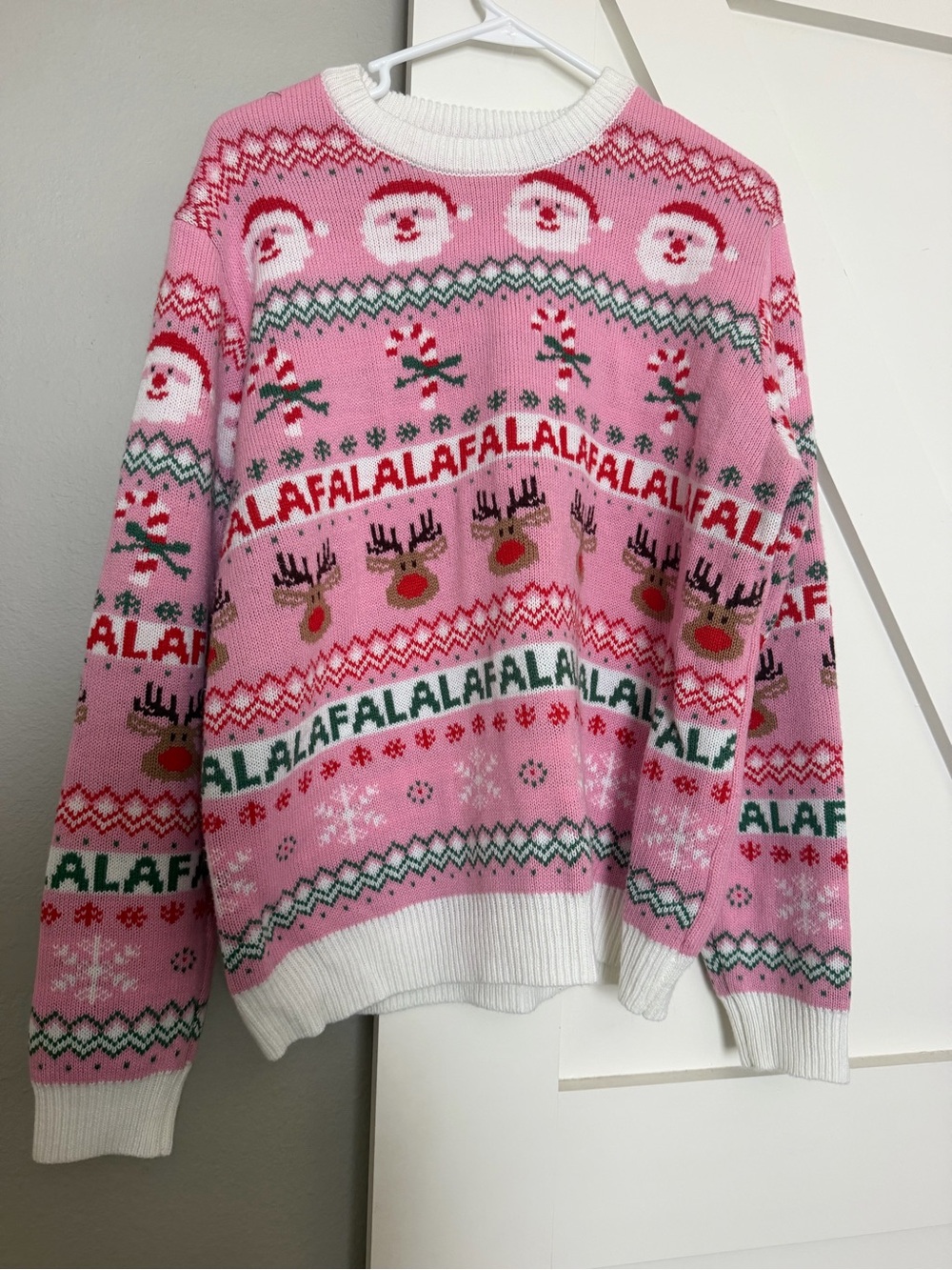 Women's Pink Holiday Crewneck Sweater with Reindeer Motif